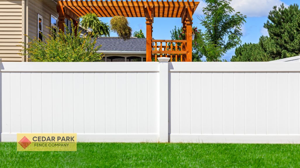 white vinyl fence