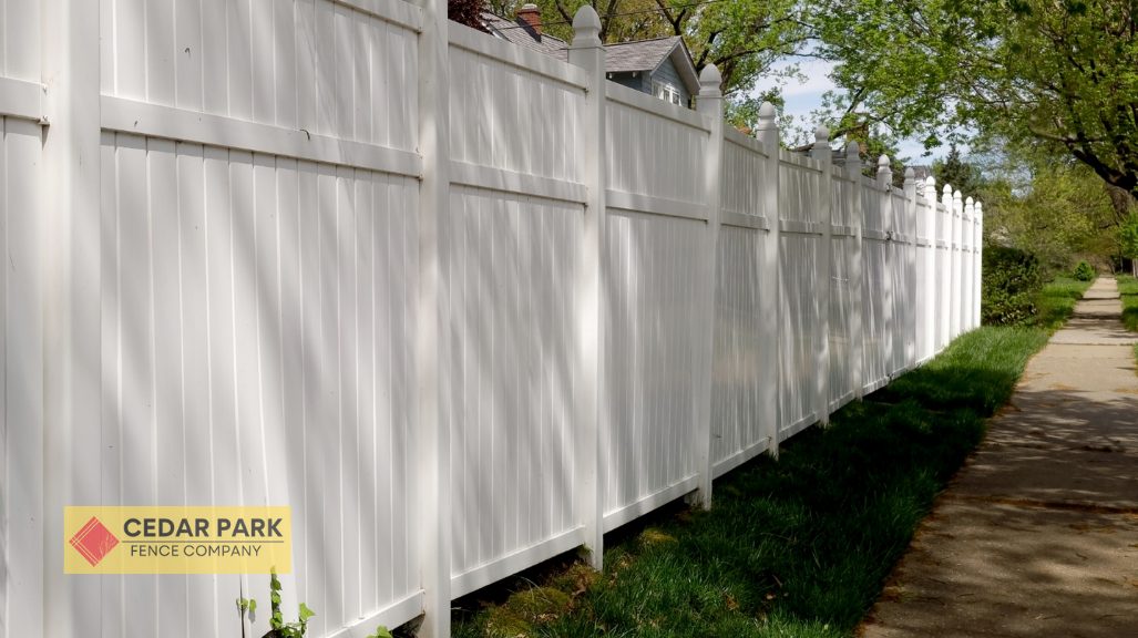 white vinyl fence