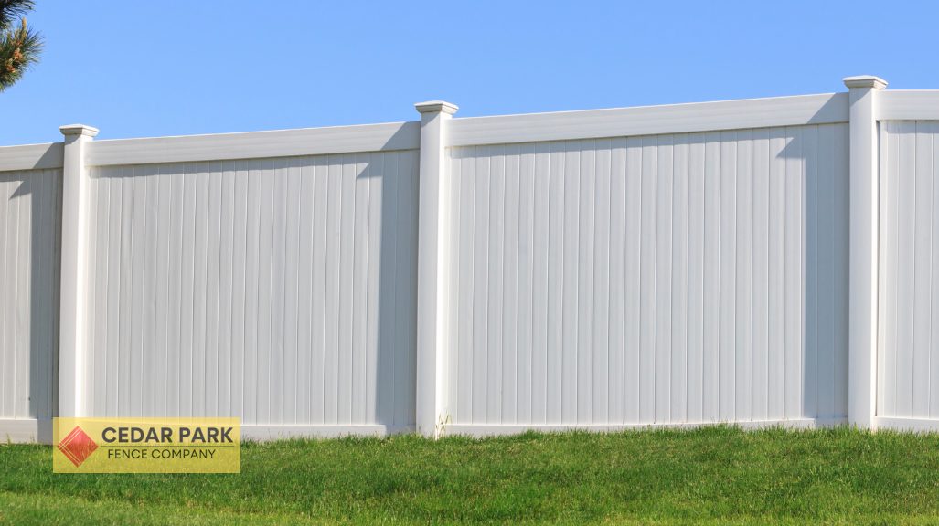 white vinyl fence