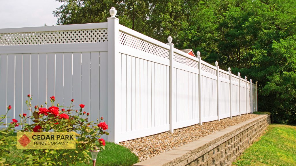 white vinyl fence